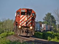 T69 leans into the curve at Innerkip after meeting an Eastbound at Drumbo.