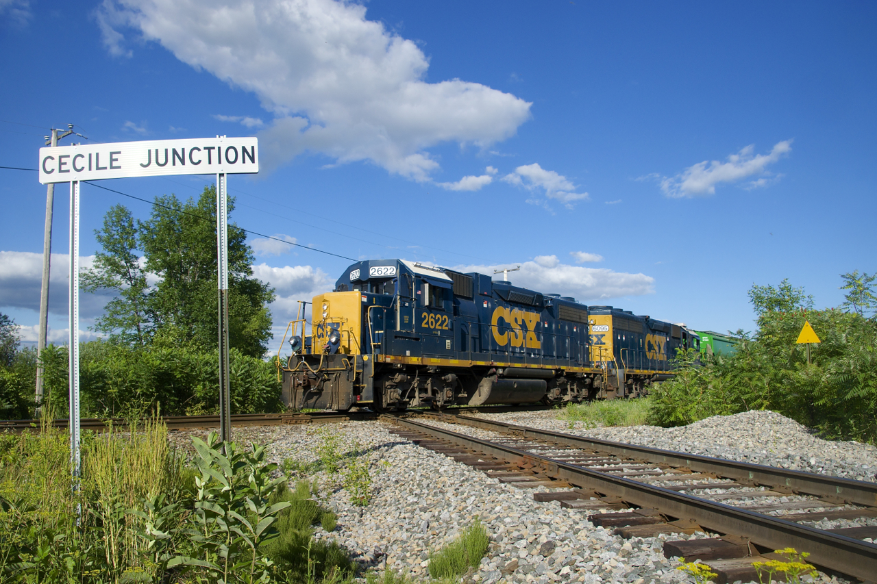 CSXT B786 is backing up over the diamond at Cecile Junction as it works the CN interchange. The train is on CN's Valleyfield Sub, with the CSXT Montreal Sub crossing it at grade here. Power is CSXT 2622 & CSXT 6095.