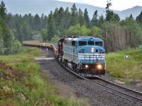 CMQ 9021 is back on the open road after being in Aylth receiving repairs the last couple of weeks. I didnt think I would end up catching it on its first trip since being released. Here 9021 and 5743 drag their ballast train towards Ft Steele BC, the rain added for a bit of a wet touch. 