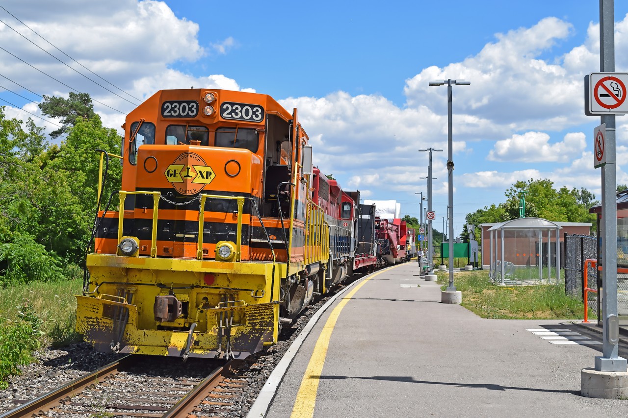 Back in 2016, GEXR took a Schnabel car from Babcock & Wilcox in Cambridge to CN at Georgetown. Here is GEXR 2303 shoving the train through the Acton GO station. Slowing to a crawl to make sure the Schnabel car doesn't hit the wheelchair access platform. Just by chance I heard about the train as it was passing through Guelph and decided to follow it to Georgetown. What a cool sight to see. 

I really don't know anything about the cargo, or where it was heading. I seem to remember a generator heading for South America? I'm sure someone will remember this and fill in the missing details for us.
