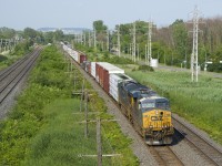 A long CN 327 (140 cars) is approaching MP 14 of CN's Kingston Sub with the usual CSX power (CSXT 799 & CSXT 3394).