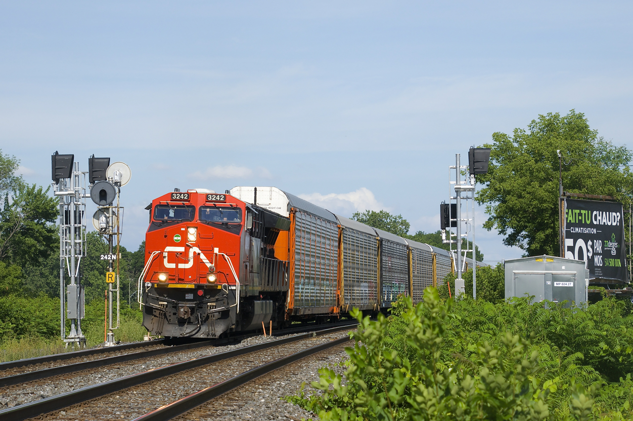 CN 271 with CN 3242 and 104 autoracks splits the intermediate signals at MP 242.2 of CN's Kingston Sub which are in the middle of being replaced.