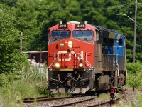 This seemed like an appropriate setting for Niagara Region railroading.The recent years have not been kind to the rails in the area, with yards closed, trains cancelled and some railroads simply leaving the area for good. Clifton was once a busy area with traffic relatively busy on both Grimsby and Stamford subdivisions. Today the large yard just ahead in Niagara Falls is completely abandoned with only the mainline surviving. All local rail served industries in the area too are now history. The weeds here are definitely taking over as train 421 leaves the Grimsby sub. for the Stamford sub. Years ago I shot locals and even the Norfolk Southern trains here along with Several CN through trains and VIA/Amtrak trains. A lot has changed and currently CN 421/422 are the only freight trains that regularly roll through the area. Hopefully things will one day pick up here. 