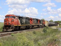 Who knows how many more of these Dash-8 I'll get to photograph before they vanish in the near future. I've been lucky over the years and will definitely miss all of the Canadian Cowls when they disappear. Thanks to a Railfan post this morning I was able to catch an impressive CN 421. CN Dash-8 2441 still wearing it's original paint from when it left the short lived GE plant in Montreal back in the 1990's. The former UP/CNW Dash-8 trailing was a nice touch too. The train is seen rolling past the removed bad order track at Tansley as it heads for the Niagara region. 