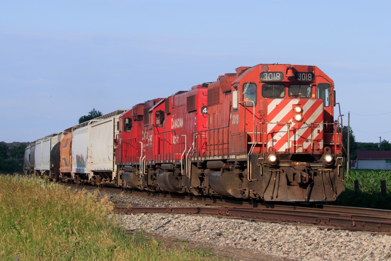 3018 leading T69 flies by Dumfries with a short train on their way west.