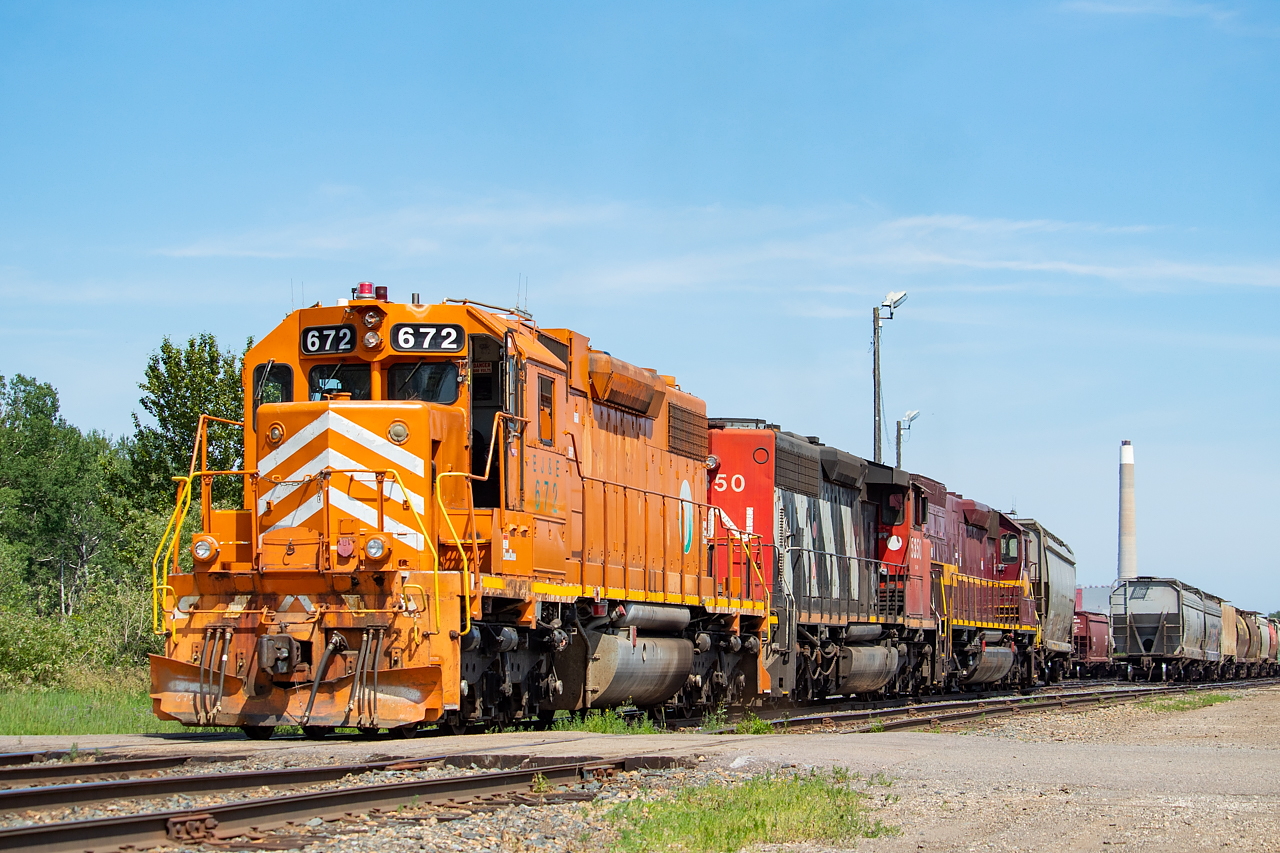 The CN Yard Job is pictured here in what I believe to be Mission Yard (corrections welcome), in the early stages of building its train to take back to Neebing Yard. I kept thinking they were soon departing, but they just kept adding more and more cars to the train. All told, they'd head back to Neebing with 197 cars in tow, most of which were grain empties (aside from 8 or so cars from McAsphalt). By my calculations (aka Google Maps measurements), they were stretched out a little more than 2 miles from where they are pictured here by the time they finally left at around 5pm, making for some ugly 'rush hour' traffic.
