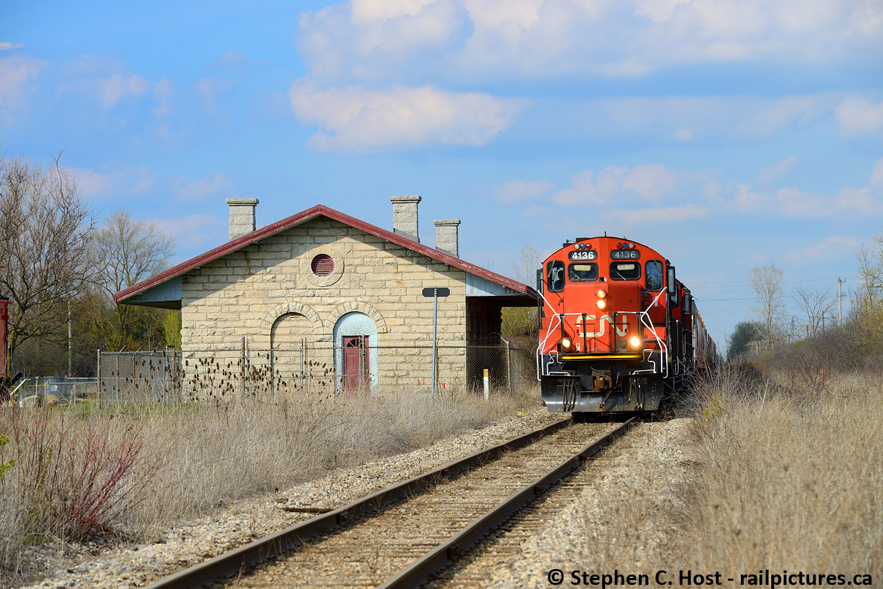 Well, vastly different lighting conditions, overgrown weeds, and other conditions meant I couldn't replicate This GEXR shot I did a couple years ago, but a trio of GP9's lead this L568 past the historic St. Marys Junction station on a nice spring day. I'll try again in the fall some year and see if I can even get close. It is really badly overgrown and i'm sure much worse now.