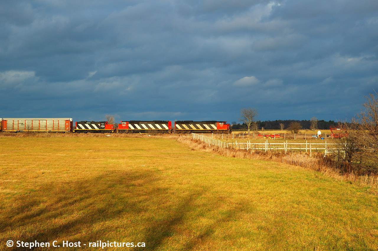 A trio of nice looking zebra painted CN units are on this westbound somewhere between the now rapidly developing lands between Milton and Burlington. I definitely got lucky with the sun at that moment, it was cloudy most of the day and this seems to be my only shot in sun.