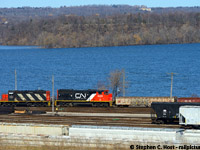 By the water, CN's 0800 yard job is seen drilling the west end of the yard in Hamilton with Burlington Bay / Lake Ontario in the background.