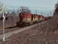 A fine image from Ron Tuff shows TH&B 402 leading a westbound, perhaps at Dewitt Rd. I imagine that this train is the crew returning to Aberdeen after an early morning jaunt to Welland. Sadly on this day the units are looking a little shabby.