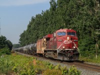 With zero expectations on what this train was, I set out for the EB CP that I watched leave London (digitally). As it rounded the bend, I realized I was about to capture the last unit train that runs on the Galt. CP 8753 leads CP 650 through Innerkip ON with CP 9720 nose out on the tail. First catch since being on vacation, I'll take it!