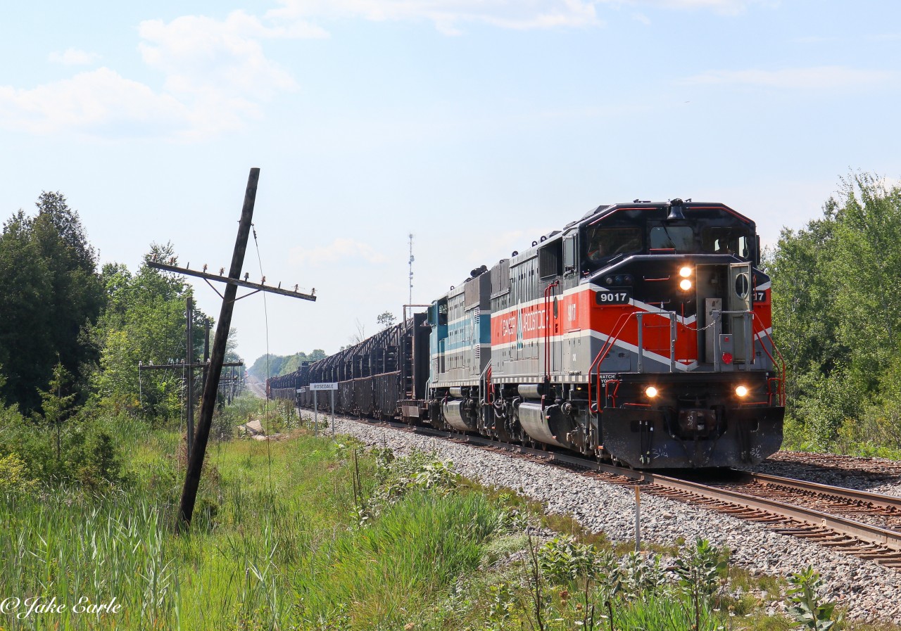 A CP Continuous Welded Rail train comes back onto the Winchester mainline, after waiting in a siding outside Smiths Falls, for 118 to pass. The train has a pair of CMQ’s for power, with the leader being a Bangor and Aroostook Railroad heritage unit, and both are actually former CP SD40-2F’s. They’re currently working on taking out the majority of the North Track, but keeping some of it for sidings, hence the reason why this train is running.