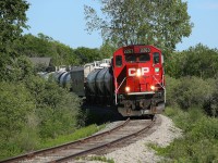 CP 2263 leads TE11 over the joined rails of the Dunnville Spur.  Having finished work at Port Maitland the train is about to pass through Dunnville on its way back to Welland Yard.