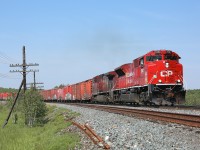 With a healthy cut of boxcars on the head end, train 420 is approaching the junction at Romford. There the train will pass from the Cartier Sub to the Parry Sound Sub and continue on its journey to Toronto. 7030 wears the shield of Lord Strathcona's Horse on its nose - the second CP locomotive to do so following in the footsteps of ES44AC 8939.