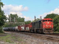 CN 305 comes by the Brockville yard on a humid Friday evening, with a rare cowl taking the lead. They’re becoming so rare to shoot considering CN is scrapping their Dash 8 fleet, but luckily in this case CN needed a cowl to lead this Moncton-Toronto Mac Yard train. 