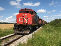 CN L568 with 4790 and 7025 are at Mile 72 of the Guelph Subdivision in Baden, Ontario heading westbound to Stratford. July 31, 2019.