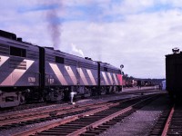 An all MLW consist leads CN's Super Continental, train 2, east out of Capreol, Ontario in September 1967. Power is an interesting mix including FPA-2 6752, FPB-2U 6858, and FPA-4 6788. Oh how I now wish I had taken the time to capture all that interesting work equipment visible ahead of the train. And yes, those people did cross in front of the train!!