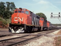 Nice trio of GP40-2L (W) locos, CN 9429, 9407 and 9455 roll Niagara-bound with what I had marked on the slide as an 'oil train', although I cannot recall where this would have come from or what it's destination was. I am sure someone viewing this can fill me in.  Thanks!!