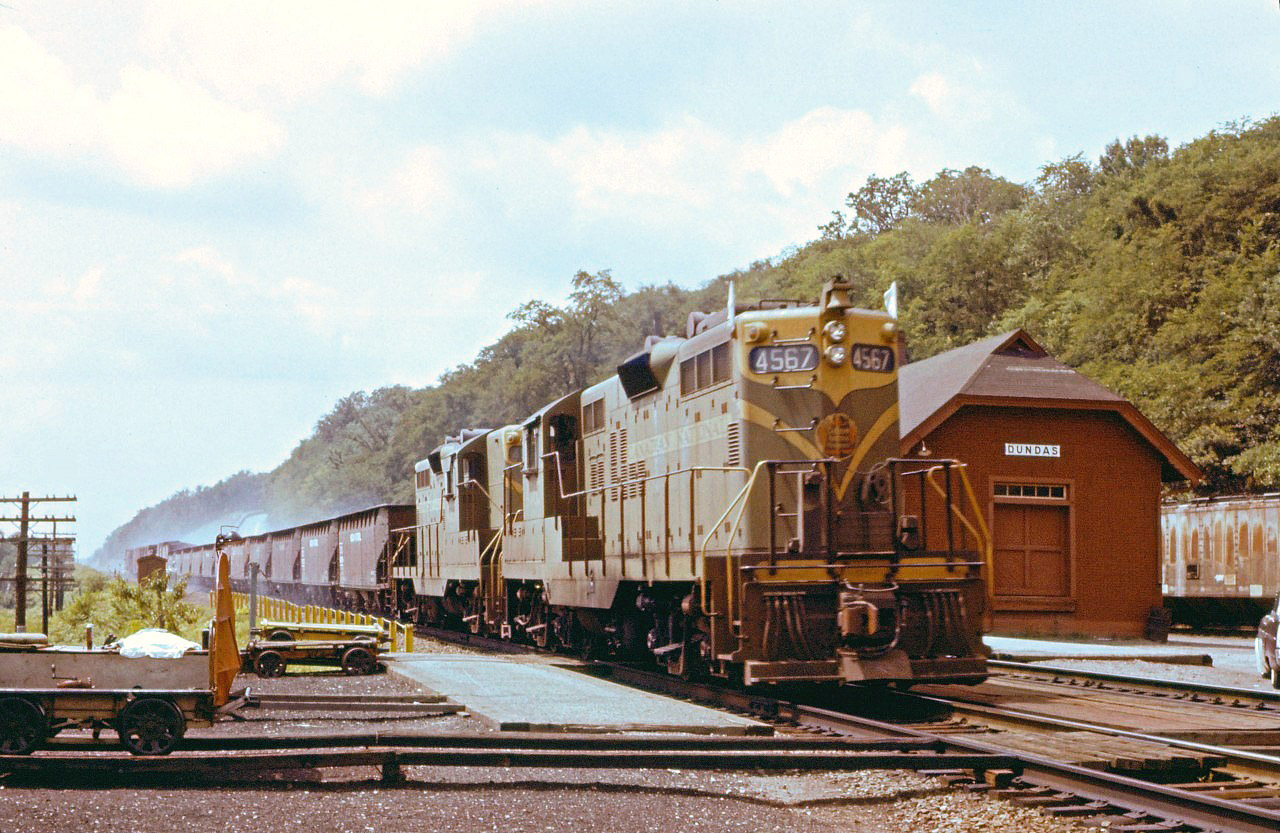 A pair of GP9s lead a 20 car eastbound through Dundas in the summer of 1961.