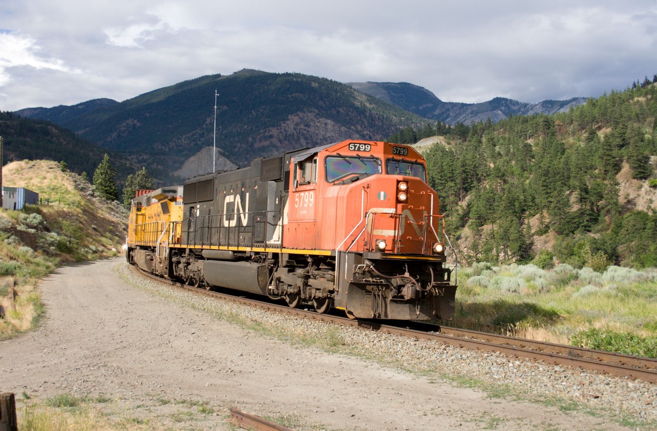 In a summer when many of us can't travel very far, let's go back to a trip to British Columbia taken in the summer of 2018. A westbound CN intermodal (105, if I recall correctly) rolls through Lytton and is about to cross the Thompson River (just before it joins the Fraser River). Power is CN SD75 5799 and GECX C40-8W 9141 (former UP 9439...don't ask me why it was renumbered!) Nice way to end a day of shooting "in the Canyon"!