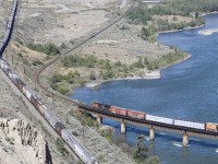 CN 3065 is westbound at MP 45.8 as it crosses the Thompson River at Ashcroft on CNs Ashcroft Sub. In this shot the 3065 is at the same location as the westbound 9552 in my recently submitted photo that was taken in 1995.     