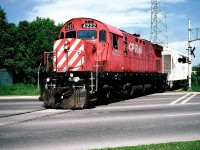C424 4222 leads the CP Guelph local across Victoria Road in Guelph with one hopper for Owens Corning after arriving from Guelph Jct. At the time seeing this unit on the local was a real surprise as it was normally not assigned C424's and usually operated with single GP7u/GP9u's and the occasional RS18u. 