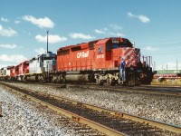 CP 5818 along with several other units are seen being moved by hostlers at CP's diesel shop in Toronto Yard. The units included; 5818, PNC 3064, 5559, 8119 and SOO Line 6621.