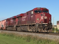 I had a little fun with CN - CP in the same photo this morning. This is the Fort Sask. switcher finally on the move after waiting for a couple of CN trains to clear the diamond at Clover Bar. I have not been at the tracks for a few weeks and what a difference today. 6 trains, all in good morning light, in an hour and half. I have not seen this much action in awhile. I must thank M. Berry for his recent comment that they are bringing CN GE barns back into service. It got me thinking, if it is busy there (Quebec) it could be busy again here, it is.  :-)