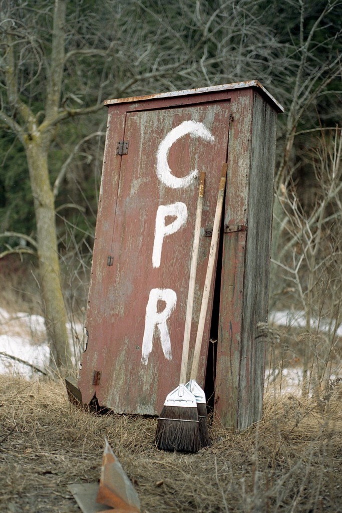 The days of endless motor car sheds, section houses, tool houses, outhouses and all that were once along the right-of-ways have vanished. It seemed like every railroad station was surrounded by these structures. I don't think many like this one survived into the 2000s. I would call this a CPR Broom Closet, as it is a little bit too thin for an outhouse. When you think of it, it is rather surprising the railroad would even go thru the bother of such a building; and this must have been pretty well the last of its era in Southern Ontario. It used to sit near the west end switches at Guelph Jct. I had marked my photo as it being at "mile 41.3". Probably just a guess. Amusing piece of history. I wish I could have brought it home. No idea why.