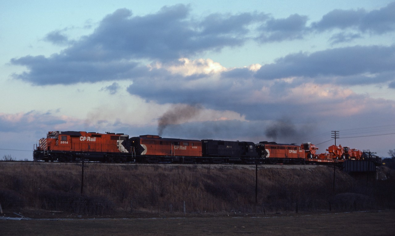 Having just departed the TH&B's Aberdeen Yard, and crossing CN's Dundas subdivision, an "Aberdeen turn" attacks the worst part of the winding grade up the Niagara Escarpment on its way to Guelph Junction and London. Today we have an interesting lash-up of GP38AC 3014, FB-1 4406, leased PNC RS27 901 (which spent many years on CP in the 1970s) and FA-2 4089.