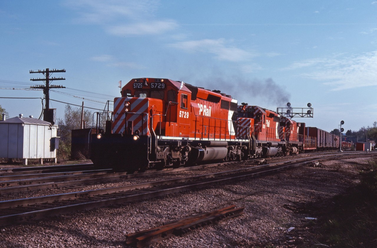 On a beautiful evening in the spring of 1977, CP's Starlight passes through Bayview on its way from Aberdeen Yard in Hamilton to Toronto Yard. SD40-2 5729, SD40 5501, and C-424 4206 power today's train.