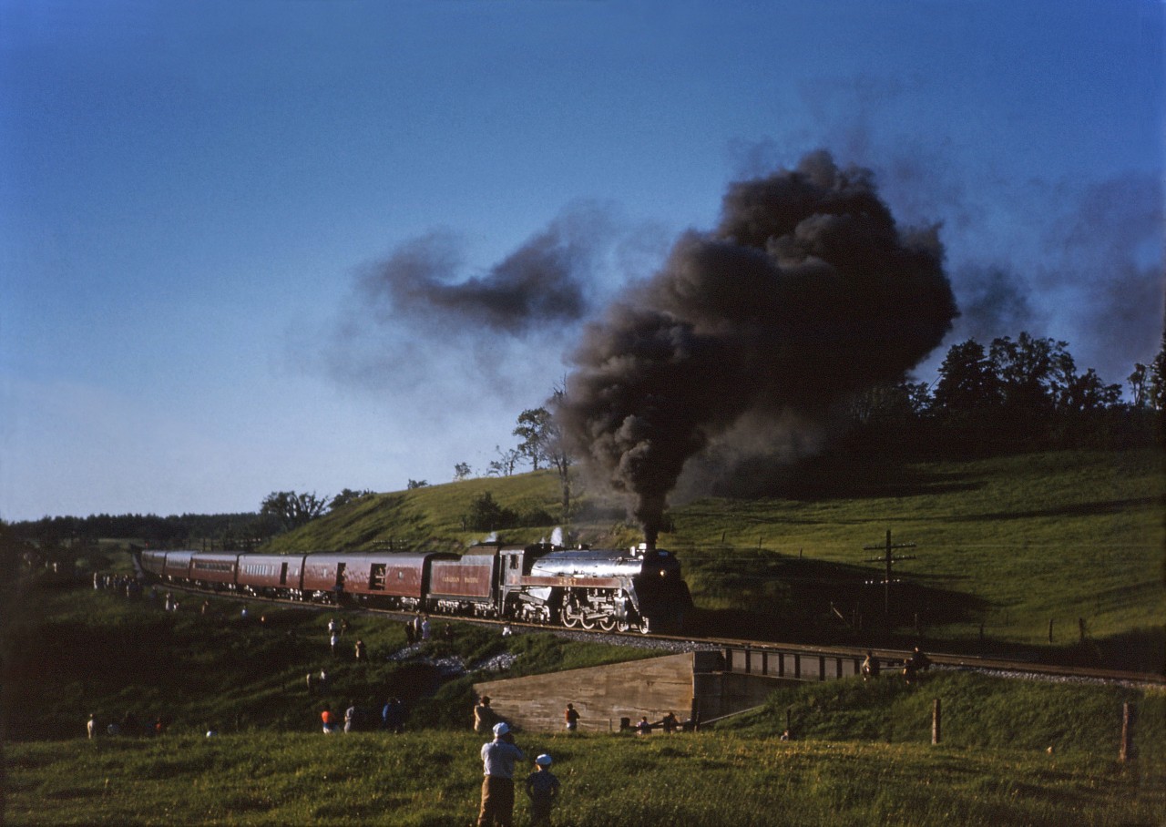 On 5 June 1960, the Upper Canada Railway Society (UCRS) sponsored an excursion from Toronto to Port McNicoll, Ontario (return) behind 4-6-4 2857. This memorable day turned out to be the last assignment for a Royal Hudson in CPR service. This shot was taken during the run-past at Eaton Mills.