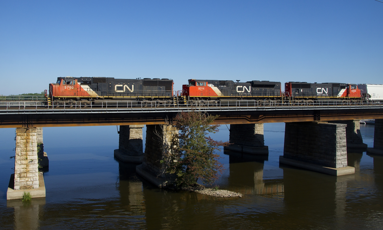CN 369 has a trio of EMD's (CN 5700, CN 8014 & CN 5668) as it crosses the Ottawa River on the north track of CN's Kingston Sub.