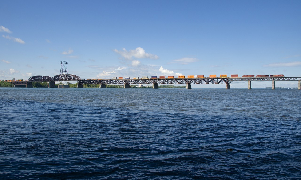 Due to an ongoing strike in the Port of Montreal, CP has been moving intermodal traffic to and from the port of Saint John, New Brunswick using its recently purchased CMQ line and the NBSR. Here CP F95 has a trio of GE's leading a 100% intermodal train into Montreal. This bridge normally sees no intermodal trains.