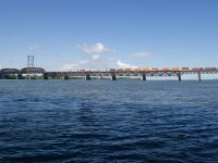 Due to an ongoing strike in the Port of Montreal, CP has been moving intermodal traffic to and from the port of Saint John, New Brunswick using its recently purchased CMQ line and the NBSR. Here CP F95 has a trio of GE's leading a 100% intermodal train into Montreal. This bridge normally sees no intermodal trains.
