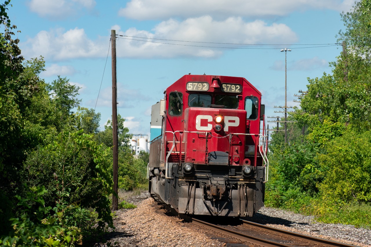 CP 5792 takes the lead of a Herzog ballast train down the Mactier sub with newly reacquired CMQ 9020 trailing as well as another SD40. 5792 was arguably "ruined" recently when a yellow frame stripe was stuck on it not too long ago, making it a little less attractive than the preferred white stripe, but I'm not really one to be picky, as seeing any SD40 makes me happy.