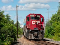 CP 5792 takes the lead of a Herzog ballast train down the Mactier sub with newly reacquired CMQ 9020 trailing as well as another SD40. 5792 was arguably "ruined" recently when a yellow frame stripe was stuck on it not too long ago, making it a little less attractive than the preferred white stripe, but I'm not really one to be picky, as seeing any SD40 makes me happy.