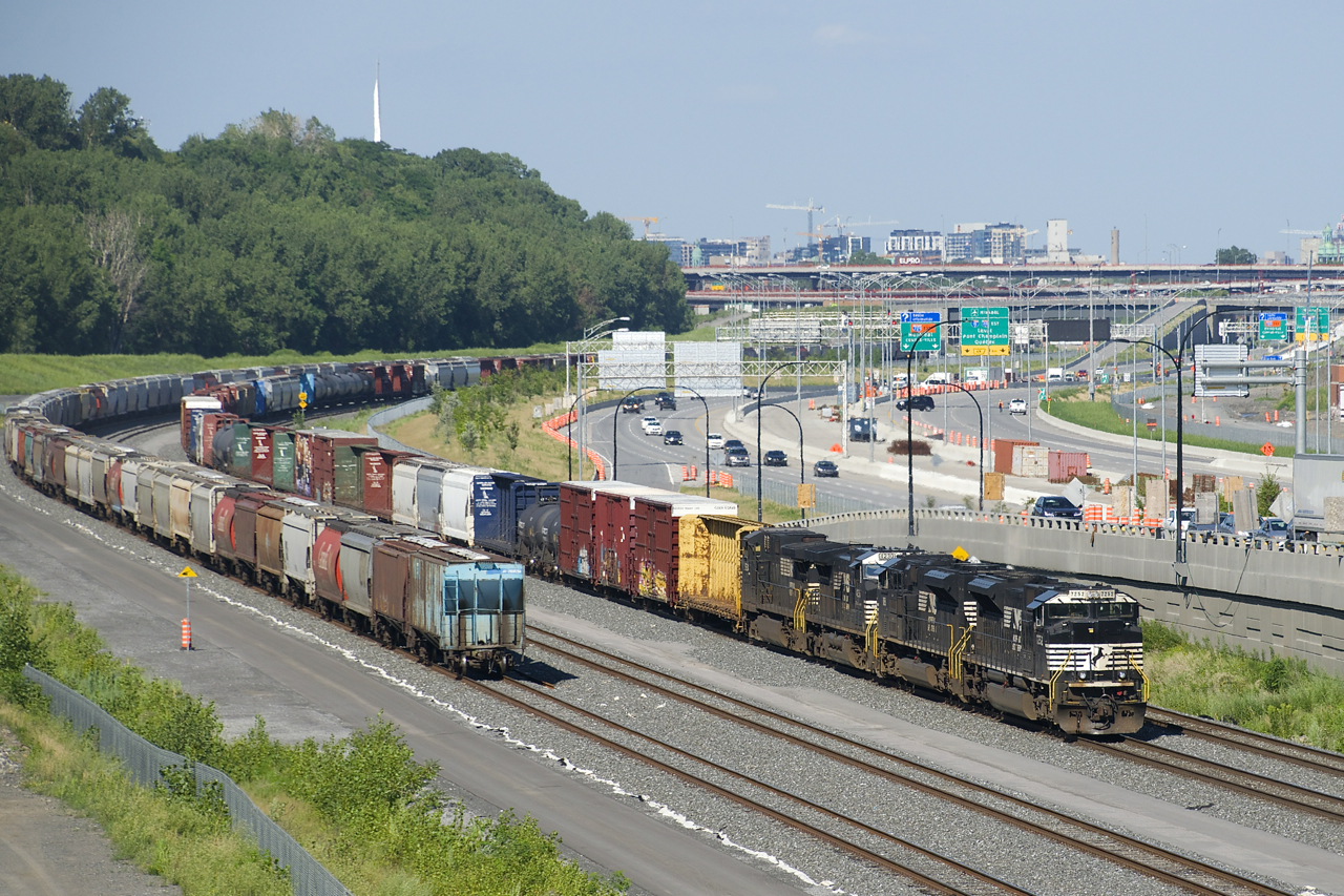 A pair of EMD's and a pair of GE's are the power on a rare daylight CN 529 (NS 7252, NS 1188, NS 4230 & NS 9284). This train has two days worth of CP 931's, which is the ID of this train when it is on CP tracks until Rouses Point, where CN picks it up to bring to Montreal. At left are a large cut of grain cars on Track 29.
