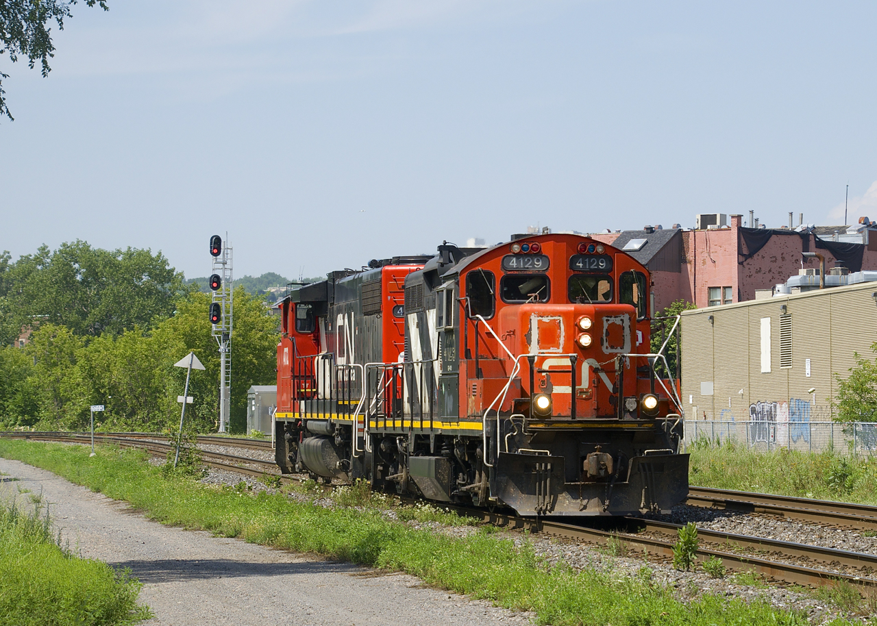 The Pointe St-Charles Switcher with CN 4129 and CN 4772 for power is heading back to its namesake yard light engine.