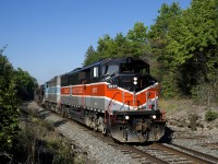 CMQ 9017 & CMQ 9011 are assigned to work train duty as they approach a spot where they will stop for nearly two hours to lift rail. As can be seen at right, the north track of CP's Winchester Sub has been lifted, as the line gets converted from double track ABS to single track CTC. It is rumoured that the rail lifted here will be sent to the CP's ex-CMQ lines out east.