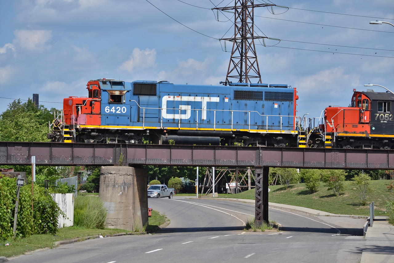 GTW 6420 crosses over Birch avenue on its way back from Stelco to Stuart completing their mornings work. Looking back at these makes me wish for cooler temperatures, running all day chasing them in 30+ degrees makes long for fall.