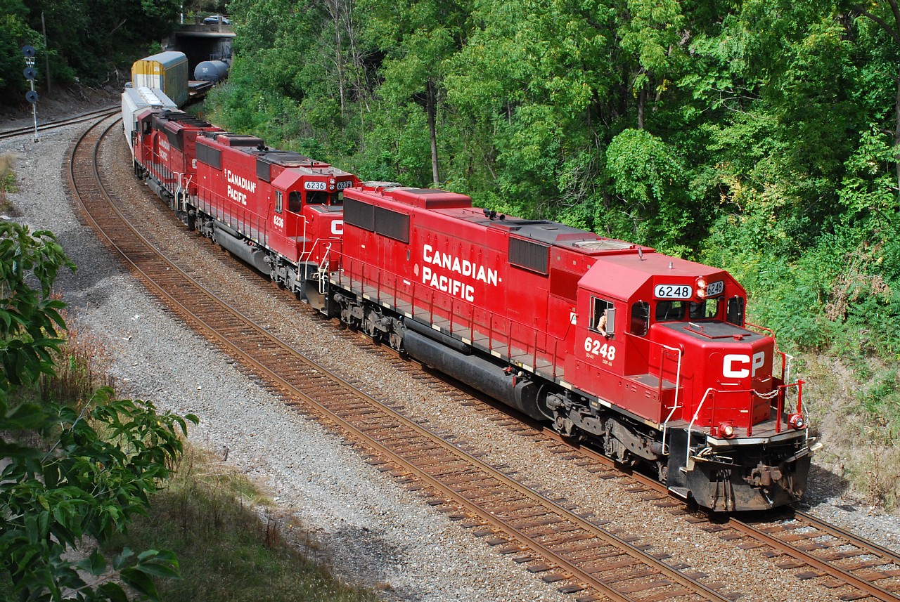 Just when you get sick of seeing pairs of CP GEs, CP puts together a considerably better consist to keep things interesting.  254/255 had a pair of SD30C-ECOs bracketing a SD60 earlier in the week, however CP 5031 was replaced by CP 6248 for today's 254.  CP 6248, 6238 and 5012 are shown curving under Main Street West and about to pass under Dundurn Street, having just met CP 247 at Desjardins.  254's consist returns from Buffalo on CP 255 the following day.