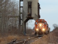 After lifting IGPC Ethanol, the engineer eases the “Cayuga Clipper” back to St Thomas past the 1940’s built CNR coal tower in Aylmer on the now out of service Cayuga Spur. The tower served CN and Wabash trains throughout the steam era and I assume was built here in Aylmer as it’s the rough half way mark from the train’s Fort Erie to Windsor route. Had the chance for sun but clouds took control unfortunately but I’m still very glad I have this scene documented