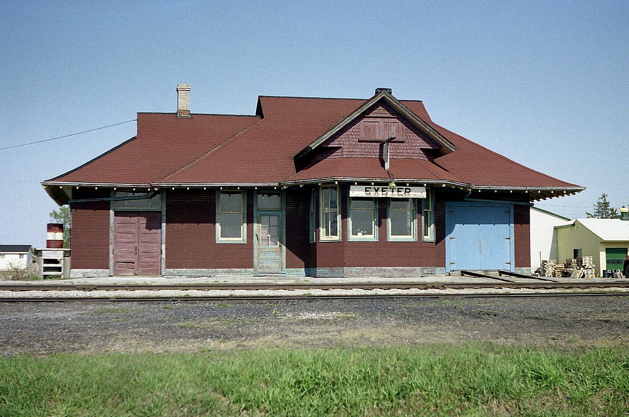 The London, Huron & Bruce railway put down track thru here in 1875. And a station served the town. A larger one was constructed at a later date and was destroyed by fire in 1911. Grand Trunk built the one pictured. The last passenger service was in 1956, and the station was modified somewhat on one end for a truck loading dock. As well, the structure served as the section crews office, lunchroom and track car housing. Closed up in 1993, it was purchased by an optometrist and moved to Grand Bend, where currently it is still in good condition and well patronized. Nice to know that it was saved.