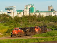 This power had come into Thunder Bay earlier in the morning on G862 (grain loads from Winnipeg) and is resting in front of several of the now disused elevators at the city's port. For anyone who likes the details - 2917 was the head-end unit, and 2888 was the mid-train. <br><br>I'd done this angle once before on my last trip to Thunder Bay - early in the morning once <a href="http://www.railpictures.ca/?attachment_id=34773" target="_blank">436 had tied down in the same spot</a>. Back then I didn't really pay much attention to lighting - it was more see train/shoot train. 