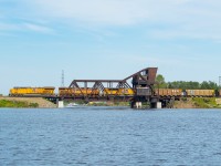 With a CP Pilot guiding the way, CN U701 is in the final stretches towards its destination of Thunder Bay Terminals, as it crosses a jackknife bridge on its way over to McKellar Island. The coke will find its way onto ship at Thunder Bay Terminals.