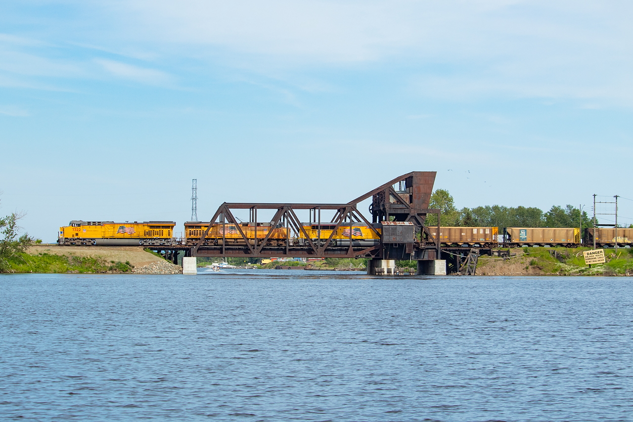 With a CP Pilot guiding the way, CN U701 is in the final stretches towards its destination of Thunder Bay Terminals, as it crosses a jackknife bridge on its way over to McKellar Island. The coke will find its way onto ship at Thunder Bay Terminals.