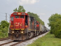 Cn 439 with a standred cab leading as it makes its way to a wye to get to Van de water 
