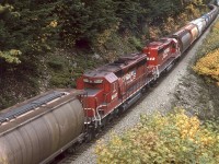 ..... and a shot of CP RCUs 6057 and 5942 that were traveling west with CP 9008 6003 5978 5171 and 5707 at China Bar on CPs Cascade Sub near Spuzzum. They're about to pass under the Alexandria Bridge which crosses over the Fraser River and both CP and CN lines at this location.