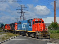 Uhhh if you told me a few years ago this would have been possible, I would have laughed and said it was a railfan's dream. I humbly submit for corrections, but I do believe this is the last GTW painted GP40 on the roster, and a former DT&I unit at that. What a Gem. Now have a look at the trailing motive power. Here the 0700 is finishing switching Parkdale Warehousing and about to run around their train, ending an end-to-end chase on the N&NW spur with this highly unusual locomotive for Hamilton locals.